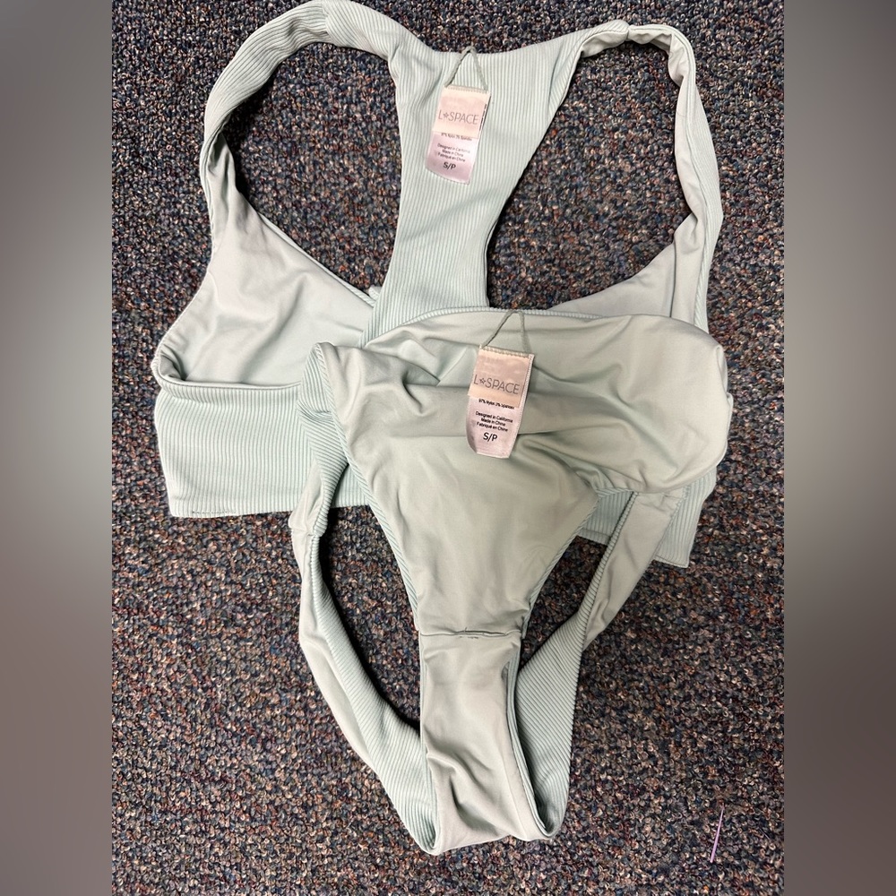 Small lspace ribbed Tara tie top and bottom. Gently used. No stains or pulls.